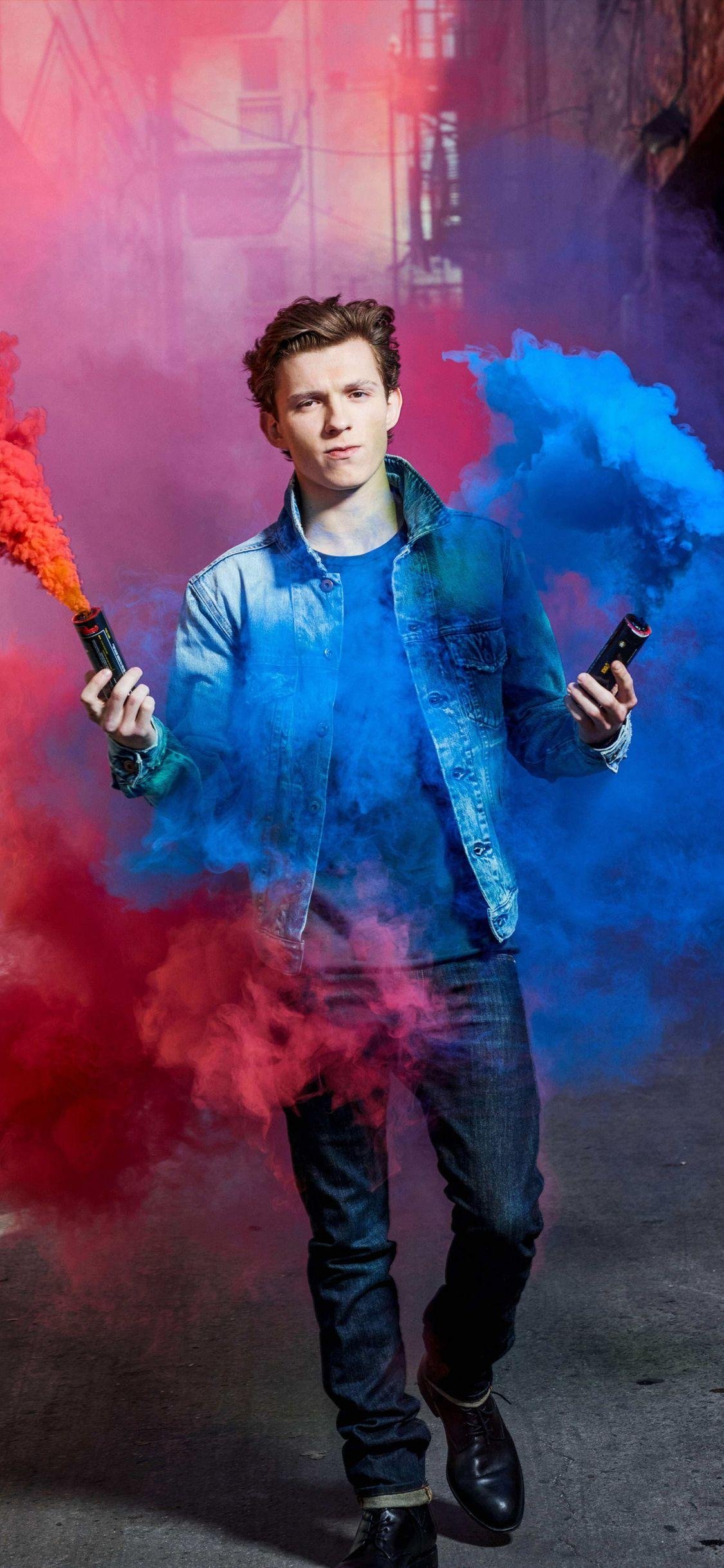 Tom Holland with blue smoke Wallpaper Download | MobCup